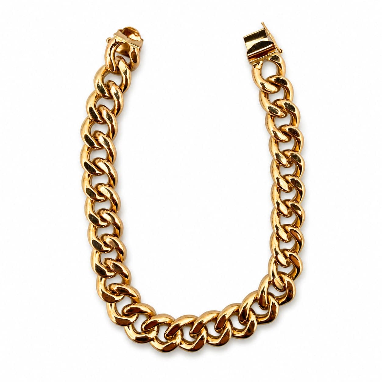 10K yellow gold double Cuban link bracelet laid flat and open to display its full 8-inch length