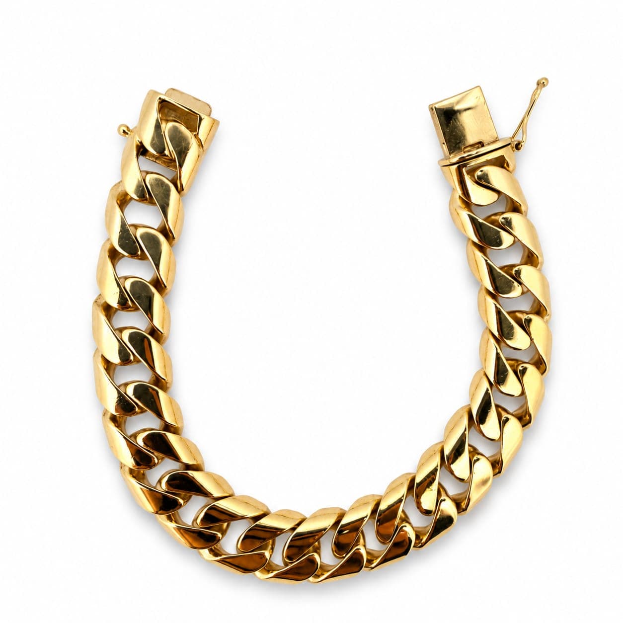 14K gold Cuban curb link bracelet laid open showing full length and link pattern