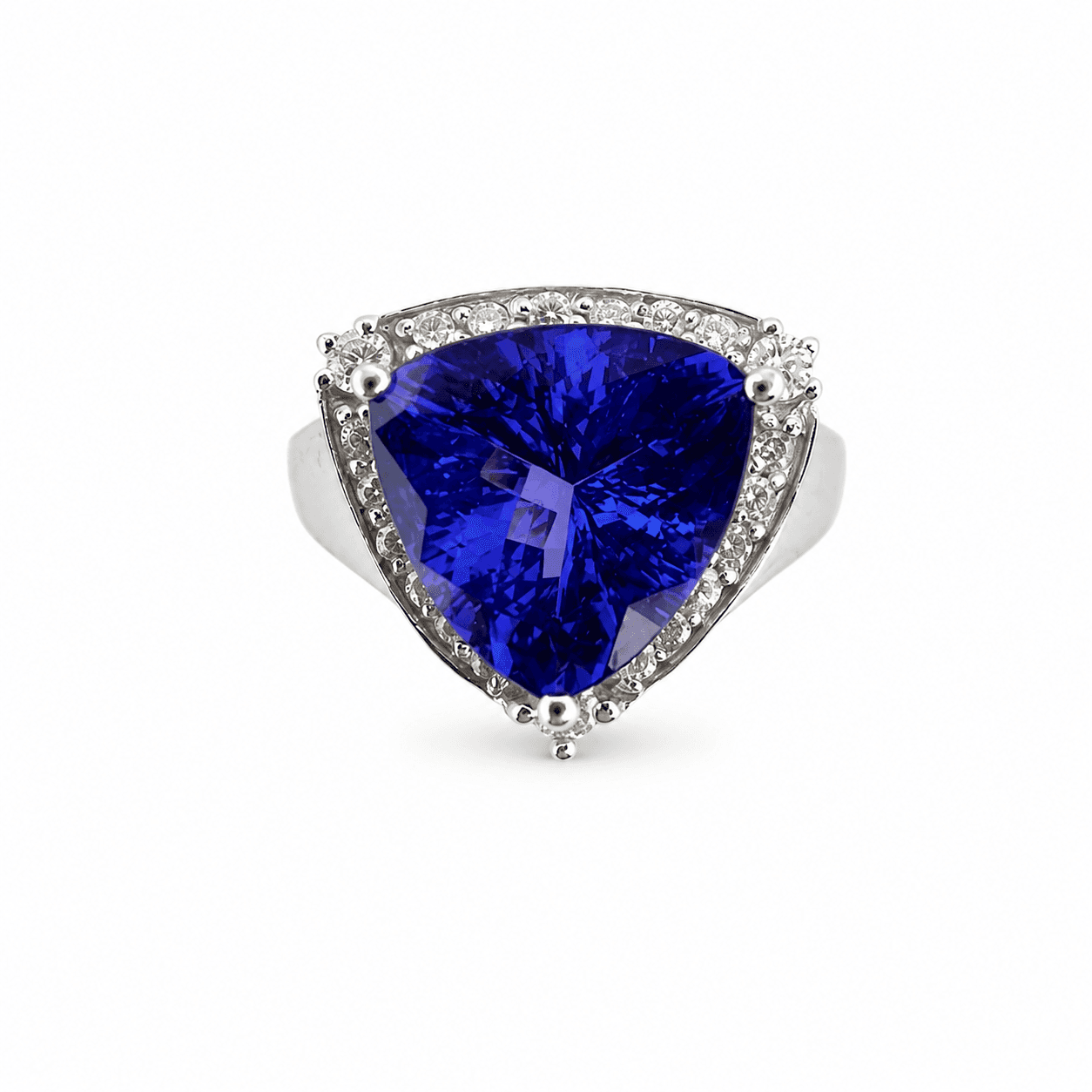 Trillion-cut tanzanite ring in 14kt white gold with diamond halo shown from a top-down front view