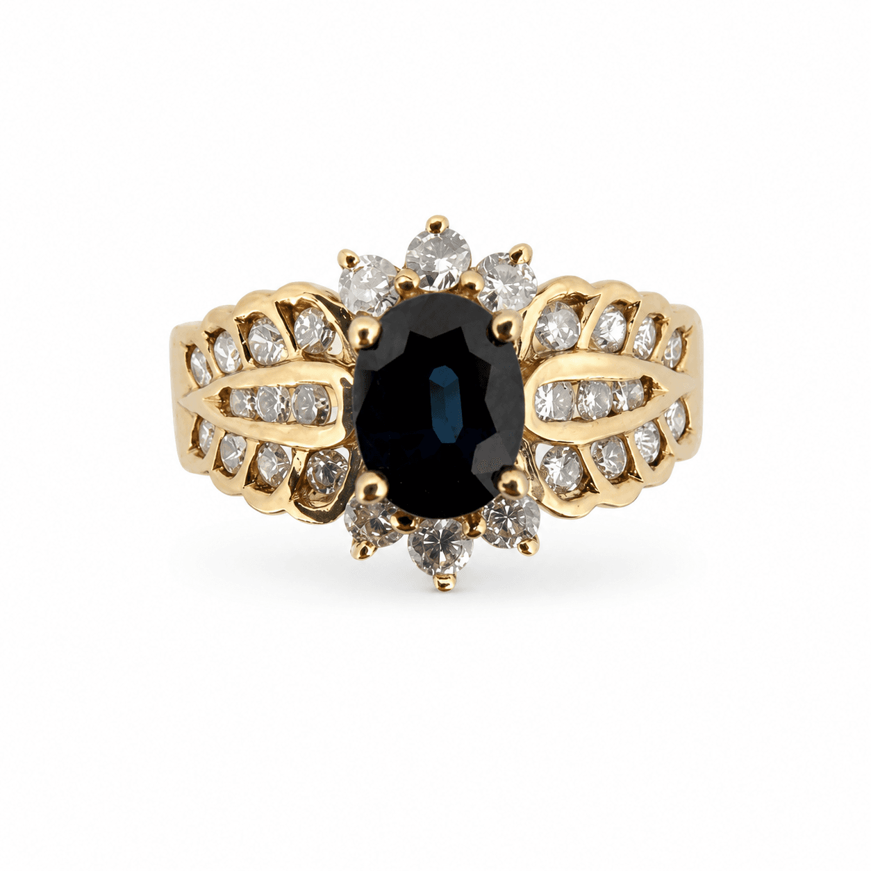 14K yellow gold sapphire ring shown from the front with oval sapphire center and diamond halo