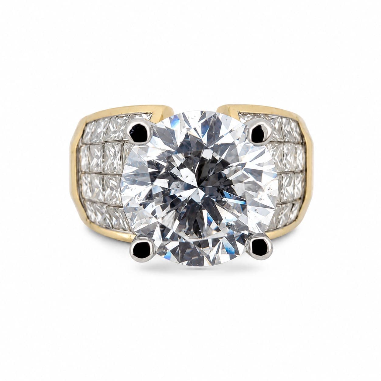 18K yellow gold diamond ring front view showing 3 carat round brilliant center stone and princess cut accent diamonds