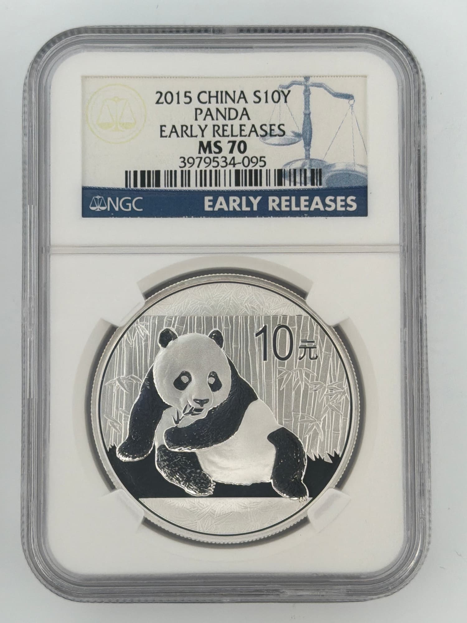 2015 China Silver Panda 10 Yuan NGC MS70 Early Releases slab obverse showing panda feeding in bamboo forest