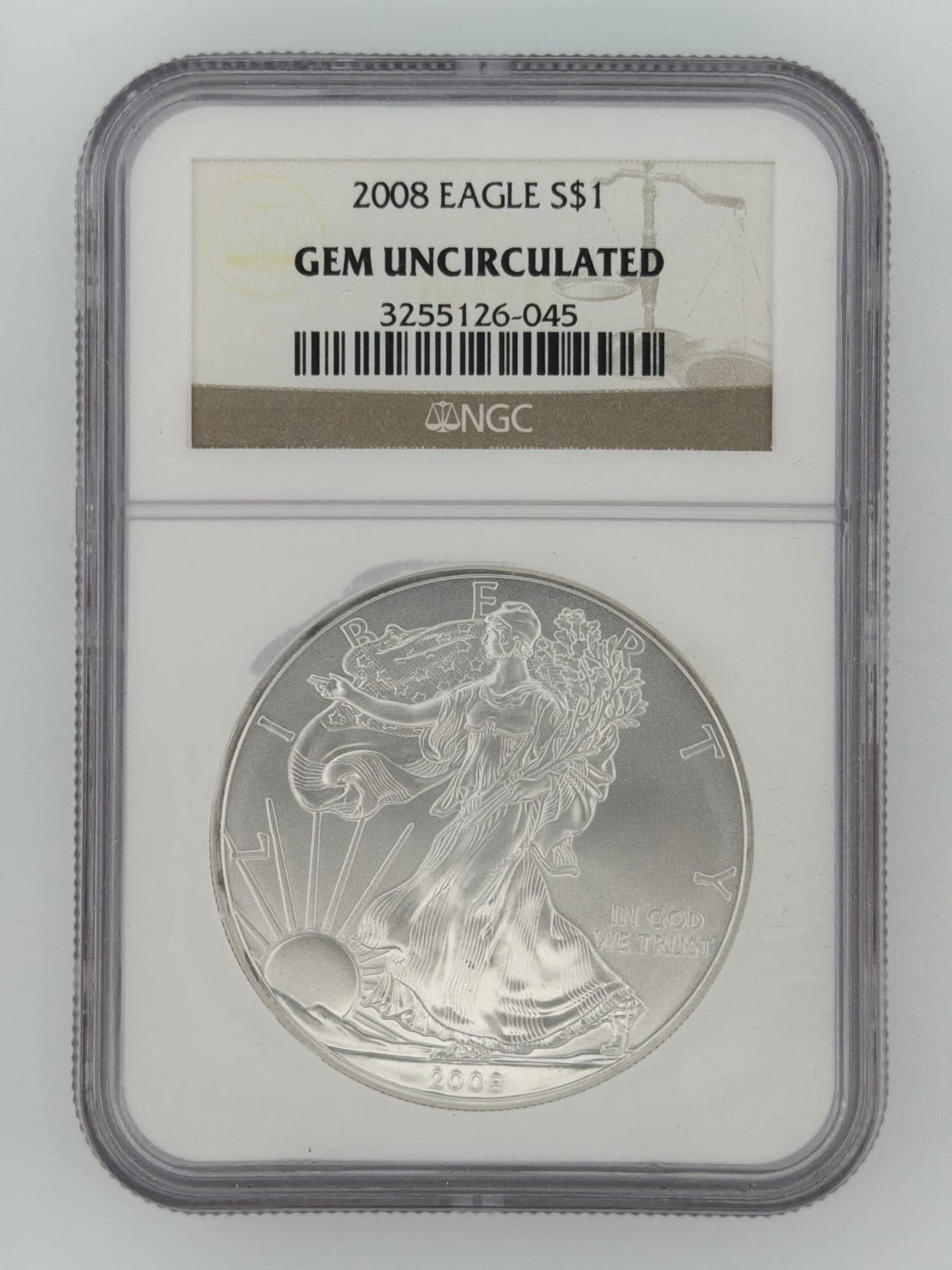 2008 American Silver Eagle NGC Gem Uncirculated slab obverse showing Walking Liberty design and NGC label with cert 3255126-045
