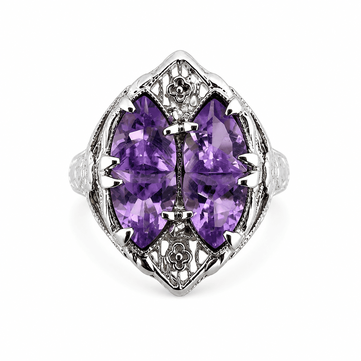 Front view of antique-style 14k white gold filigree ring with four trillion-cut amethyst stones