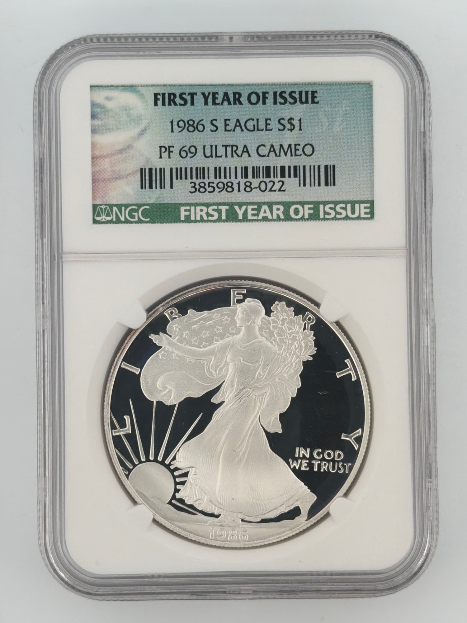 1986-S American Silver Eagle NGC PF69 Ultra Cameo slab obverse — Walking Liberty design with First Year of Issue green label