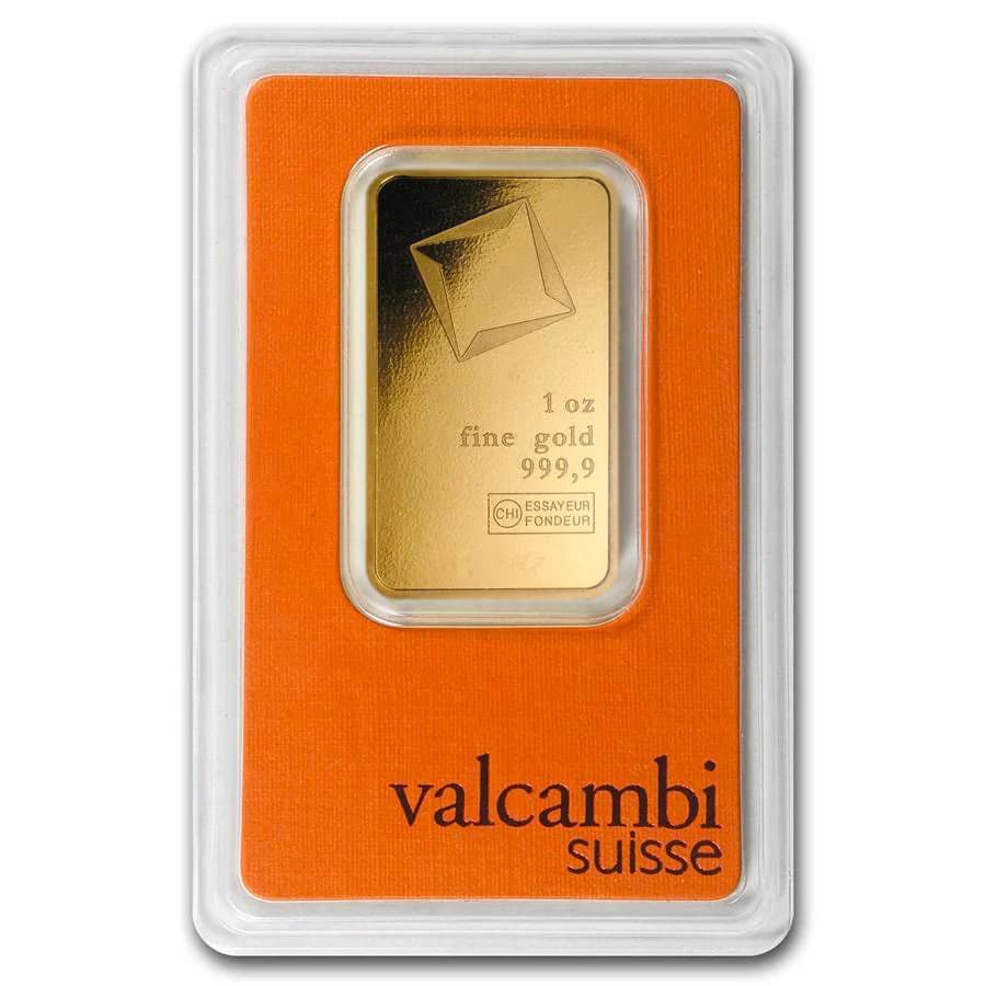 Valcambi Suisse 1 oz 0.9999 fine gold bar sealed in original orange assay blister card showing CHI Essayeur Fondeur hallmark and faceted diamond design
